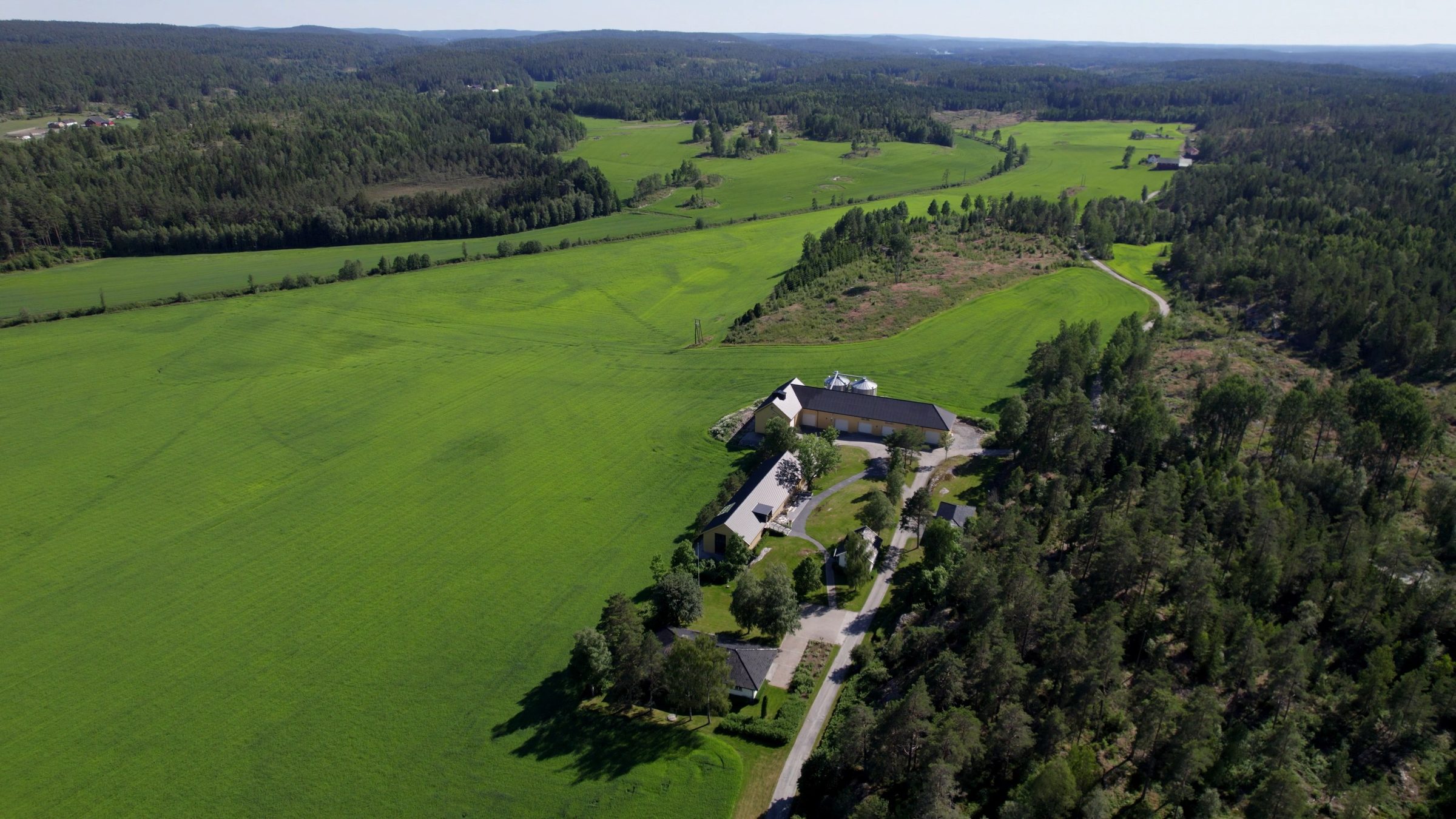 Tveter farm and its fields, seen from the drone